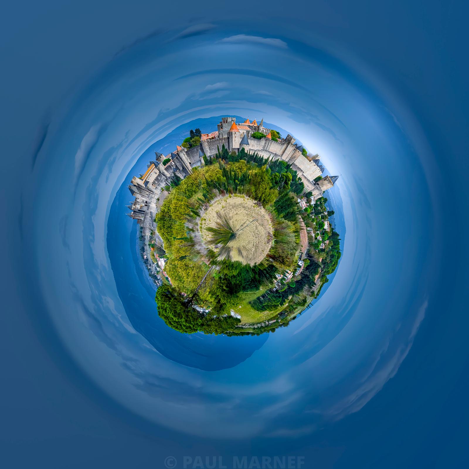 Eternal Carcassonne, the citadel and vegetation transformed into a mini-planet beneath a blue sky, photograph by Paul Marnef